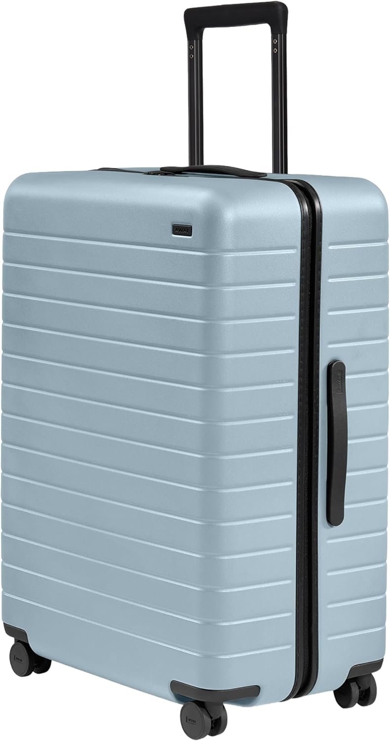 Away Amazon Exclusive Large Checked Luggage – 29-Inch Lightweight Hardside Suitcase with Four WhisperGlide 360° Spinner Wheels, Interior Compression System, TSA-Accepted Lock – Sky Blue